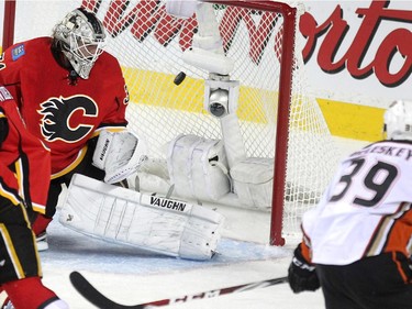 Calgary Flames goalie Karri Ramo looked over his shoulder as a shot by Anaheim Ducks left winger Matt Beleskey sailed into the net for the Ducks third goal of the game during second period NHL playoff action at the Scotiabank Saddledome on May 5, 2015.