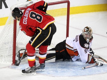 Calgary Flames centre Joe Colborne slid the puck past the pads of Anaheim Ducks goalie Frederik Andersen for the Flames second goal of the game during second period NHL playoff action at the Scotiabank Saddledome on May 5, 2015.