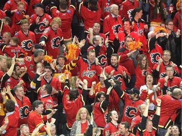 Calgary Flames fans went crazy in the stands after Johnny Gaudreau scored the tie goal against the Anaheim Ducks with 20 seconds to go in regulation time during third period NHL playoff action at the Scotiabank Saddledome on May 5, 2015.