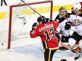 Anaheim Ducks goalie Frederik Andersen turned to look and Johnny Gaudreau celebrates as a shot by Calgary Flames centre Mikael Backlund (not pictured) went into the net during the overtime period  of Game 3. The 4-3 result was the first loss of the playoffs for the Ducks.