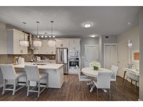 The kitchen offered in a condo at Sage Place by Cardel Lifestyles.