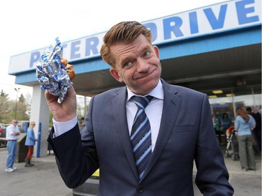 Leader of the Wildrose Party Brian Jean stops in at Peters' Drive -In for a milkshake and burger in Calgary on May 1, 2015.