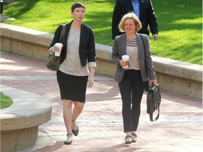 Premier Rachel Notley, right, walked into McDougall Centre in Calgary on May 27, 2015 for the first cabinet ministers meeting for the new NDP government.