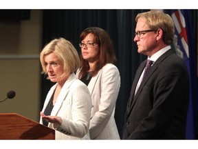 Premier Rachel Notley, left, was joined by Minister of Justice and Aboriginal Affairs Kathleen Ganley and Education Minister David Eggen as she made announcements regarding funding for school boards and the stoppage of the closure of the Calgary Young Offenders Centre.