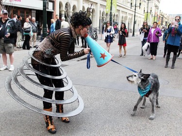 Cast member Klara the Telegraph of the Invisible stopped to interact with Gus the dog owned by Lyndsey Dangerfield.