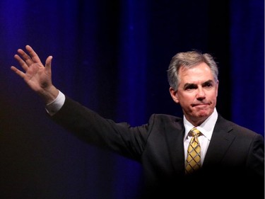 Outgoing Premier Jim Prentice waves to the crowd after his speech during the PCAlberta Calgary leader's dinner at the Telus Convention Centre.