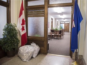 A couple bags of shredded papers lie outside the minister of environment offices. A massive transition will occur at the legislature in the coming days as the Conservatives move out to make way for the NDP government.