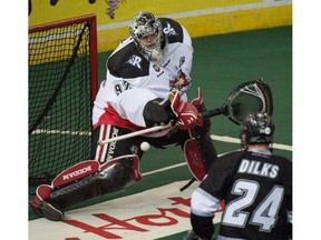 Roughnecks goalie Frankie Scigliano makes a save against the Edmonton Rush during Game 1 of the West Division final Rexall Place in Edmonton.