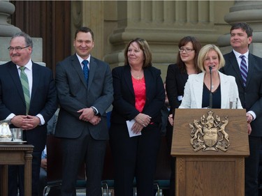 Premier Rachel Notley and her 11 cabinet ministers are sworn in on the legislature steps in Edmonton . May 24, 2015.