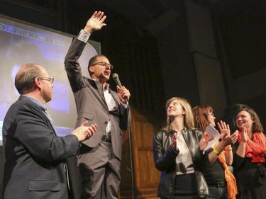 Joe Ceci embraces NDP supporters at the Arrata Opera Centre in Calgary on Tuesday, May 5, 2015.