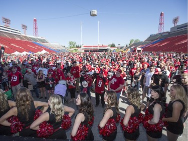 Thousands of fans turned out to meet the Stampeders and catch a glimpse of the Grey Cup at the annual Stampeders Fanfest at McMahon Stadium in Calgary, on May 23, 2015.