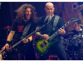 Frank Bello, left, and Scott Ian, of Anthrax, perform on stage during the Metal Allegiance concert at the House of Blues on Wednesday, Jan.  21, 2015, in Anaheim, Calif.