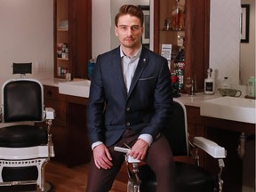 Michael Campbell in his Chin Whiskey Shearing & Shaving shop in downtown Calgary