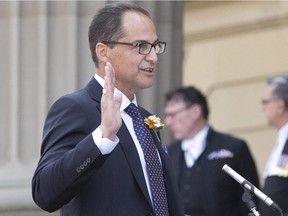 Joe Ceci is sworn in as the Alberta Minister of Finance and president of Treasury Board in Edmonton on Sunday, May 24, 2015.