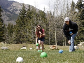 Amanda Young and her 10-year-old daughter, Taya, play bocce ball at the Mount Kidd campground in Kananaskis Country.