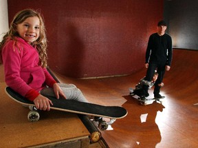 The skateboard family of Wade Cose, with his children Mason, 7, and Madi, 5, show off the ramps in their Lynnview garage.