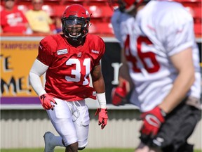 Calgary Stampeders linebacker Jasper Simmons runs a drill during the first day of the team's training camp at McMahon Stadium on Sunday.