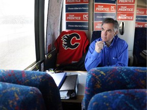 Premier Jim Prentice on his campaign bus en route to a campaign stop in Redcliff, Ab. on April 16, 2015.