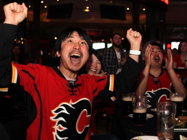Shun Nanami celebrates a good play during the Flames Game at Flames Central on Sunday night  May 10, 2015.