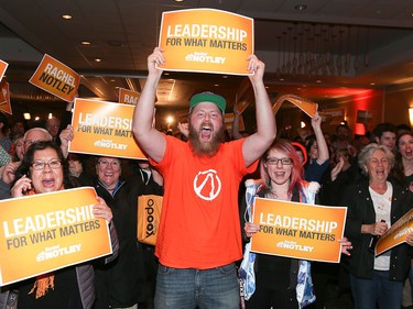 NDP supporters react as they watch the results at NDP leader Rachel Notley's headquarters in Edmonton on Tuesday, May 5, 2015.