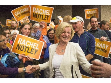 NDP Leader Rachel Notley shakes hands with supporters at the University of Calgary on May 2, 2015.
