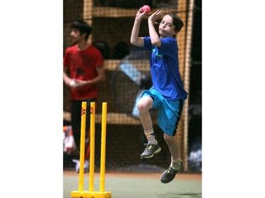 Glenmore Cricket Club Junior Academy member Josh Honywood, 11, practiced bowling as he took part in the practice at the Absolute Baseball Academy on May 6, 2015.