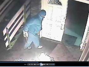 Okotoks RCMP are searching for an arson suspect after a fire erupted at the Bull Pen Pub at 35 Riverside Drive on May 8, 2015, and displaced three neighbouring businesses.