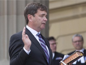 Oneil Carlier is sworn in as the Agriculture and Forestry minister in Edmonton on May 24, 2015.