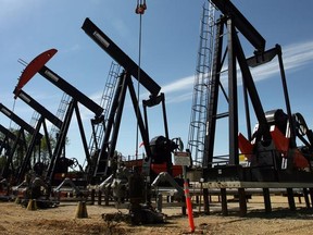 Pumpjacks pull bitumen from beneath the boreal forest at the Shell oilsands plant near Peace River a few years ago.