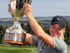 Norway's Suzann Pettersen holds up 2009 CN Canadian Womens Open trophy after she won the tournament at Priddis Greens. For the first time since that September, the tour is coming back to Calgary, Aug 22-28, 2016.