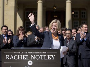 Alberta Premier-designate Rachel Notley addresses the media in front of her caucus in Edmonton, Alta., on Saturday, May 9, 2015.