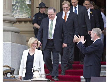 Rachel Notley is applauded as she makes her way in to be sworn in as Alberta's 17th premier in Edmonton on Sunday, May 24, 2015.