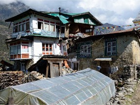 Red Deer man Brian Robinson took these photos in Lukla, Nepal, last week. The area -- considered only moderately affected by the earthquake -- now has most residents living in tarps. ,