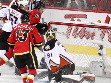 Calgary Flames centre Sean Monahan watched as the puck sailed past Anaheim Ducks goalie Frederik Andersen during first period NHL playoff action at the Scotiabank Saddledome on May 8, 2015. Flames left winger Johnny Gaudreau set up the goal on a breakaway.