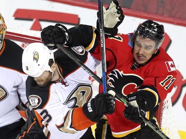 Calgary Flames centre Mikael Backlund and Anaheim Ducks defenceman Clayton Stoner battled infront of the Ducks net during third period NHL playoff action at the Scotiabank Saddledome on May 8, 2015. The Ducks won the game 4-2 and took a three games to one lead over the Flames in the series.