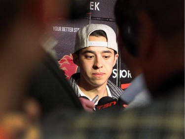 Calgary Flames player left winger Johnny Gaudreau spoke to the media during the annual garbage bag day at the Scotiabank Saddledome on May 12, 2015.