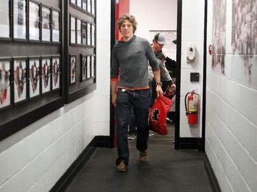 Calgary Flames player goalie Jonas Hiller walked out of the dressing room during the annual garbage bag day at the Scotiabank Saddledome on May 12, 2015.