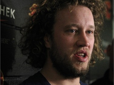 Calgary Flames player goalie Karri Ramo spoke to the media during the annual garbage bag day at the Scotiabank Saddledome on May 12, 2015.