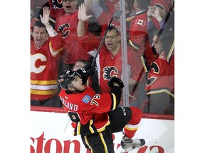 Calgary Flames left winger Micheal Ferland celebrates after scoring the Flames second goal of the game agaisnt the Anaheim Ducks during first period NHL playoff action at the Scotiabank Saddledome on May 8, 2015.