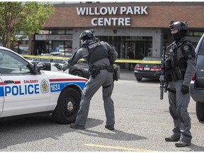Calgary TAC gets ready to enter Willow Park Centre after the reports of a shooting inside, on May 27, 2015.