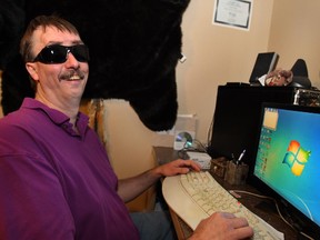 Recent advances let Calgarian Mike Hambly play video games with verbal commentary and sound effects on a PC in his home. Hambly lost his vision following a 1994 car accident.