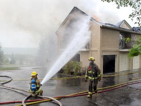 Rocky View Fire Fighters from multiple areas helped fight a house fire in Springbank. According to neighbours, the house was unoccupied. The house was heavily damaged including the back wall which collapsed.