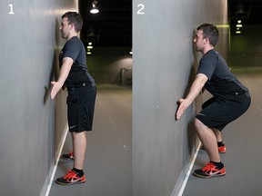 Stand facing a wall with your feet slightly more than shoulder-width apart and about 
2.5 centimetres away from the wall. Slightly turn your knees out and sit back and down, keeping your weight on your heels and your back tall. The focus here is to feel the hamstrings 
stretching out and bearing the load, Bochek says. Keep sitting down until your thighs are parallel with the ground and then stand up out of the squat, focusing on using your hamstrings.
Do five sets of five squats.