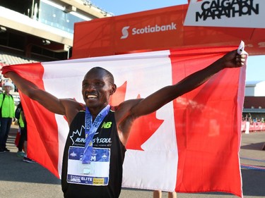 Kip Kangogo came in first in the men's half marathon.