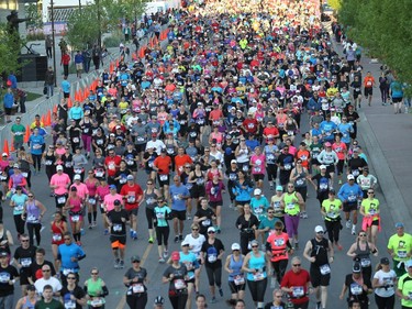 Runners in the long races head out as the Scotiabank Calgary Marathon, which kicked off at 6:30 a.m. on Sunday, May 31, 2015.