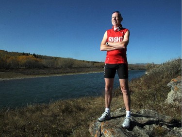 Marathon runner Martin Parnell poses along the banks of the Bow River near his Cochrane home Thursday September 27, 2012.