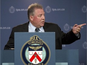 Toronto Police Services Inspector Howie Page addresses members of the media at Police Headquarters about the seizure of $550,00 dollars in five kilograms of cocaine, $170,000 in cash and one kilogram of ketamine which were being sent via a national courier to Edmonton, Alberta, Thursday May 22, 2015. Anh Tung Li, 28 of Woodbridge, has been charged with trafficking cocaine, trafficking ketamine and two counts of proceeds of crime.