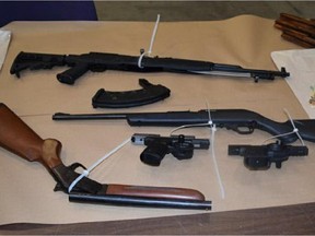 FILE ART: Two men are accused of supplying firearms used in a series of shootings in January and February 2015 in northeast Calgary, after police executed a warrant at a residence in the 1700 block of 28 Street S.W. on May 5, 2015, and seized two handguns, two rifles, a shotgun, and a variety of illicit drugs were seized from the residence.