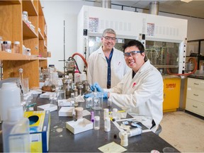 University of Calgary Chemistry professor George Shimizu, left, will lead the CREATE Training Program in Carbon Capture with the focus on training students such as graduate student Roger Mah.