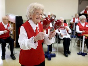 Monica Ogston performs with the Rythym Kats, a seniors rhythm band in Calgary.